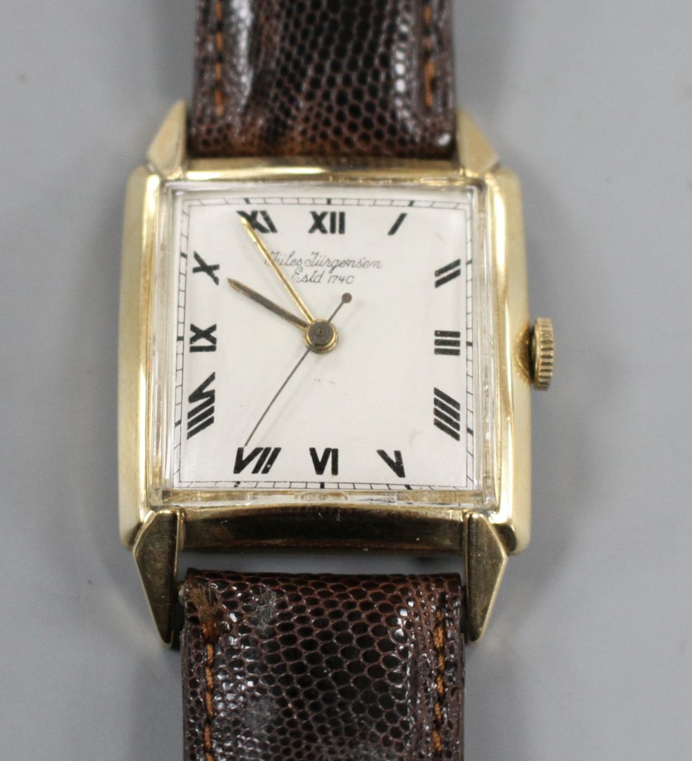 A gentlemans 1950s? 14k Jules Jurgensen manual wind wrist watch, with square tumbling Roman dial,